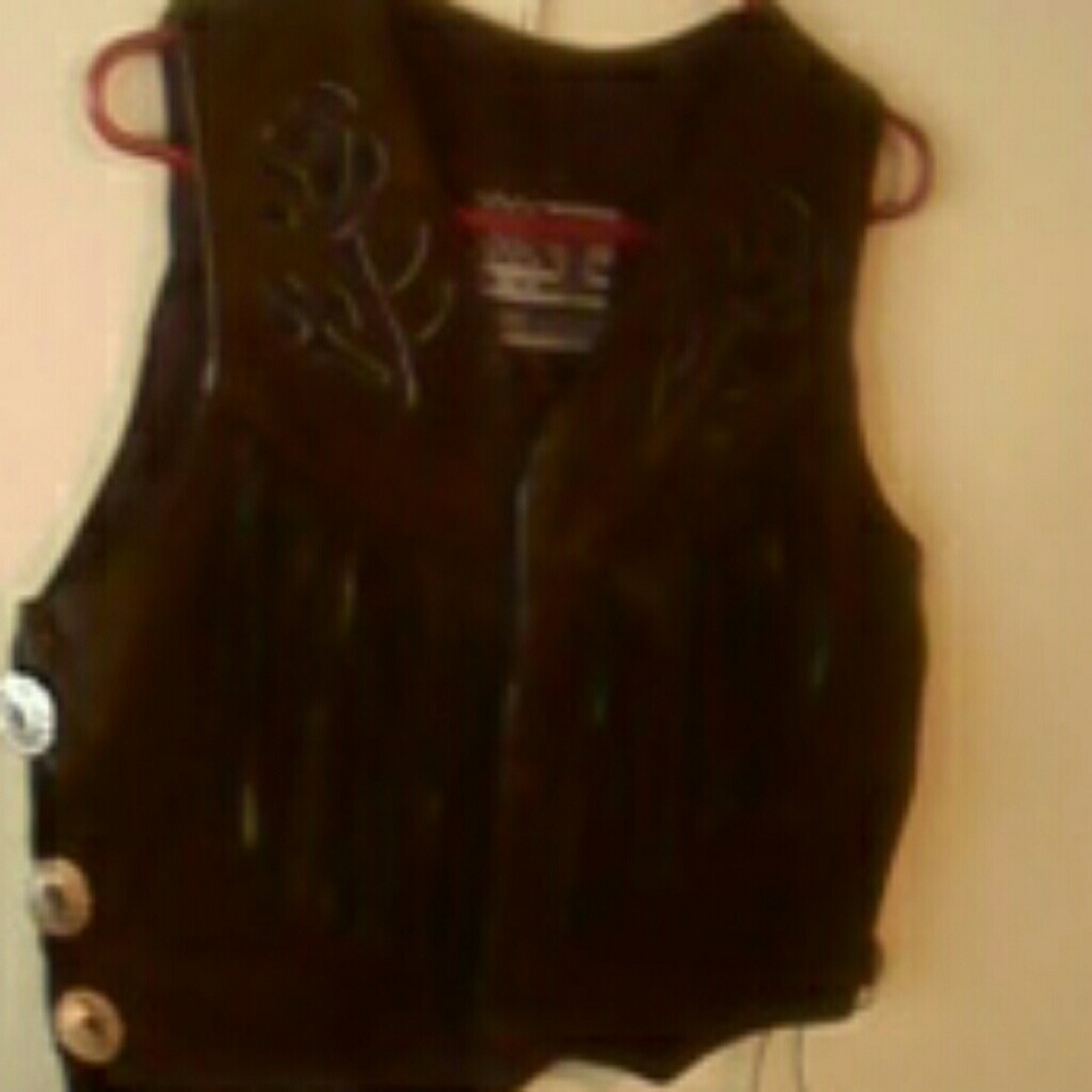 Woman's black leather biker vest.